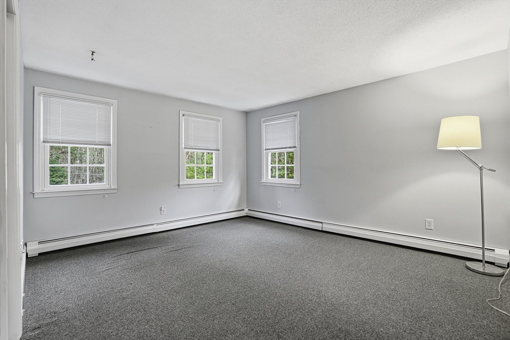 6 Hickory Lane Upton, MA 01568 - Photo 34 of 36 an empty room with windows