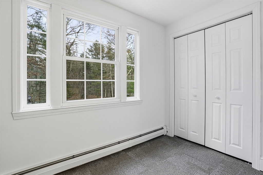 6 Hickory Lane Upton, MA 01568 - Photo 35 of 36 an empty room with windows