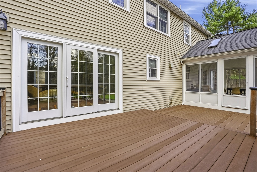 6 Hickory Lane Upton, MA 01568 - Photo 7 of 36 a view of a house with a deck