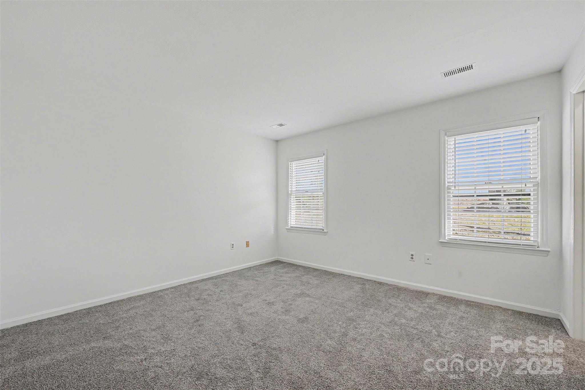 2730 Quailrush Road Charlotte, NC 28226 - Photo 14 of 22 an empty room with a window