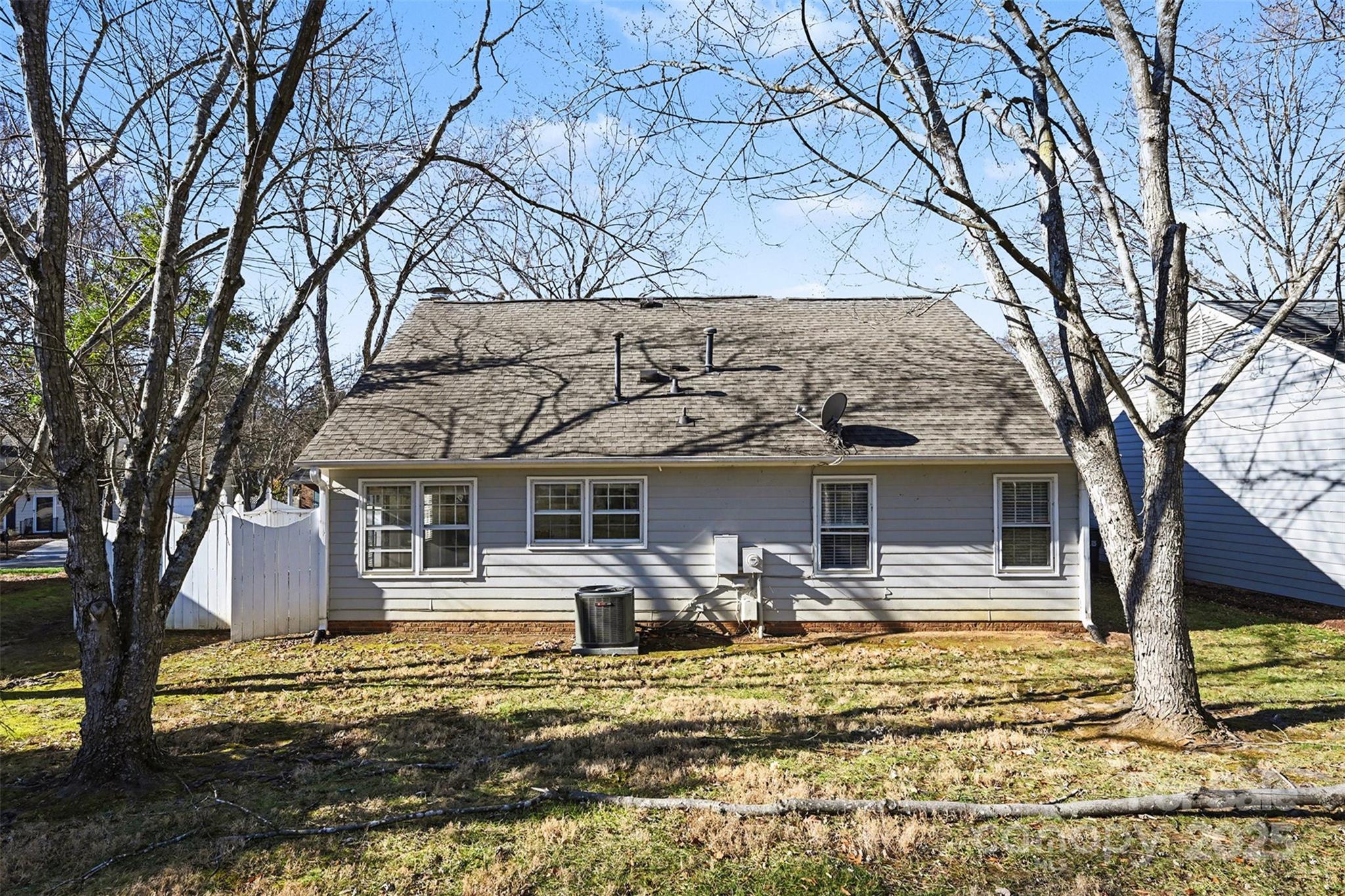 2730 Quailrush Road Charlotte, NC 28226 - Photo 20 of 22 a front view of a house with garden