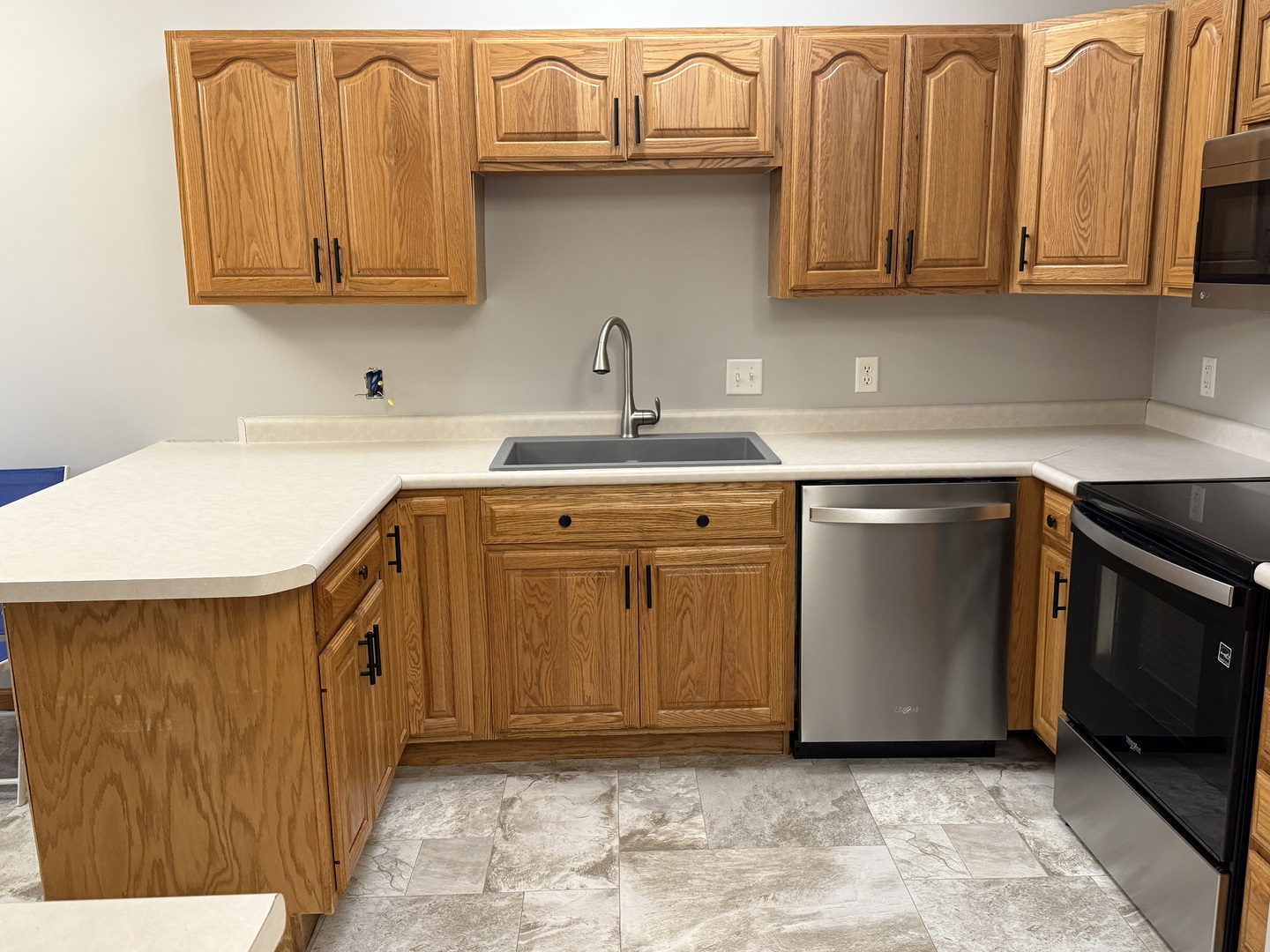 311 West Franklin Street Princeton, IL 61356 - Photo 7 of 19 a kitchen with a sink and cabinets