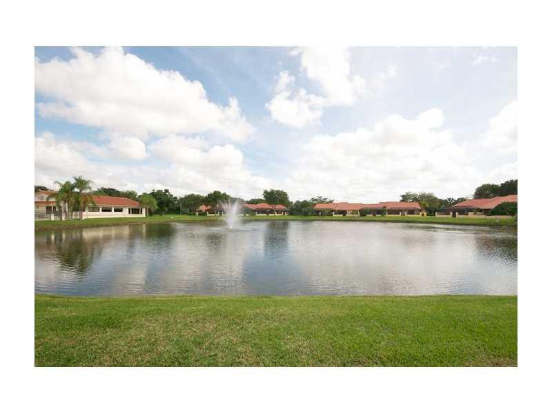 19972 Mona Circle, Unit 19972 Boca Raton, FL 33434 - Photo 20 of 22 a black and white photo of a lake