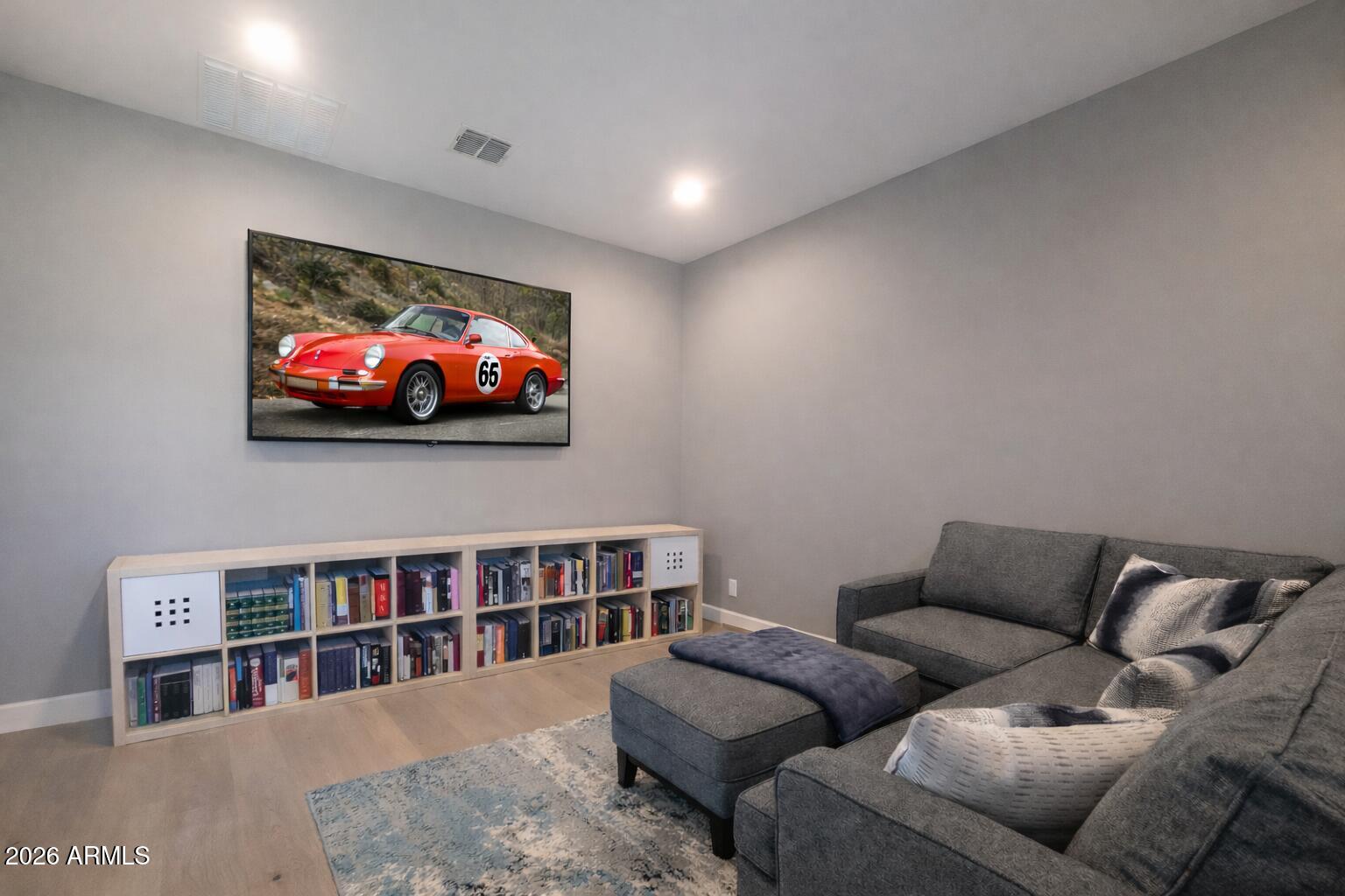 17907 East Slide Rock Drive Rio Verde, AZ 85263 - Photo 42 of 82 a living room with furniture and a book shelf