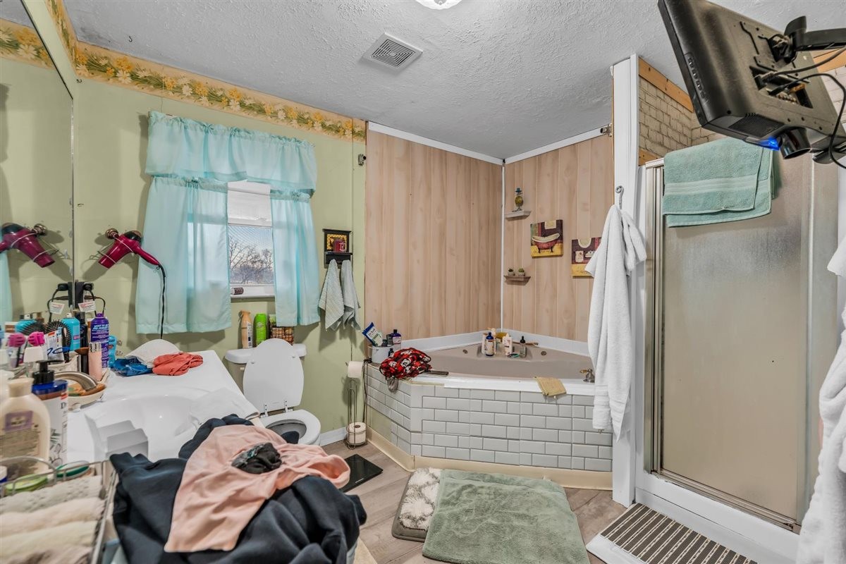 3133 Academy Road Portland, TN 37148 - Photo 16 of 24 a bed room with a bed and a window