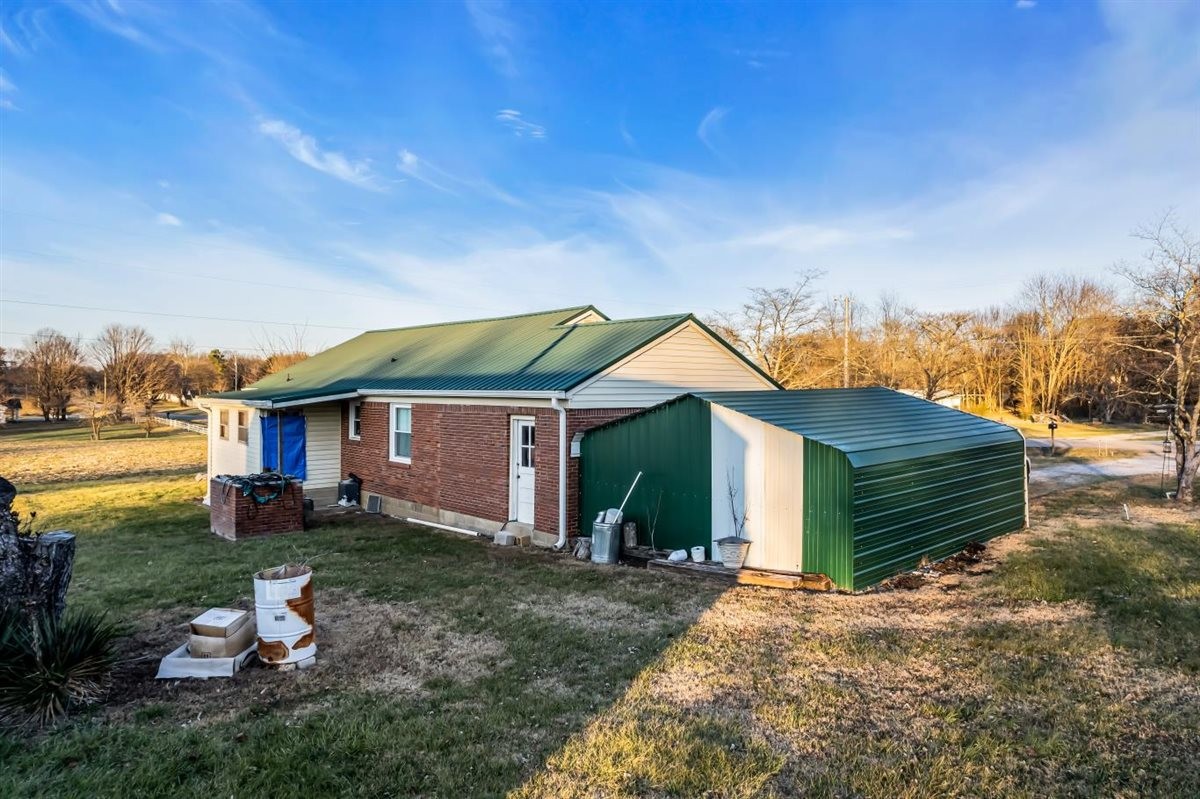 3133 Academy Road Portland, TN 37148 - Photo 20 of 24 a front view of a house with garden