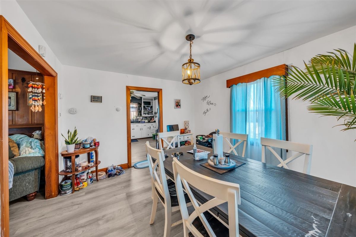 3133 Academy Road Portland, TN 37148 - Photo 8 of 24 a view of a dining room with furniture window and wooden floor