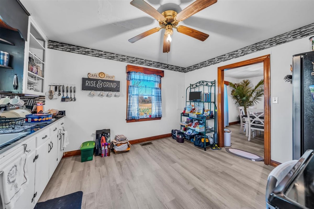 3133 Academy Road Portland, TN 37148 - Photo 10 of 24 a view of a livingroom with furniture ceiling fan