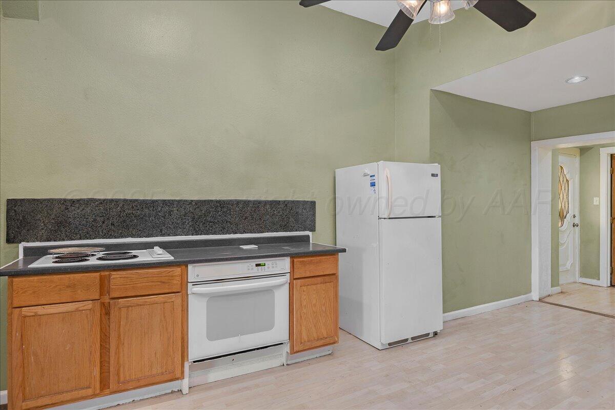 1403 South Hughes Street Amarillo, TX 79102 - Photo 16 of 54 a utility room with dryer and washer