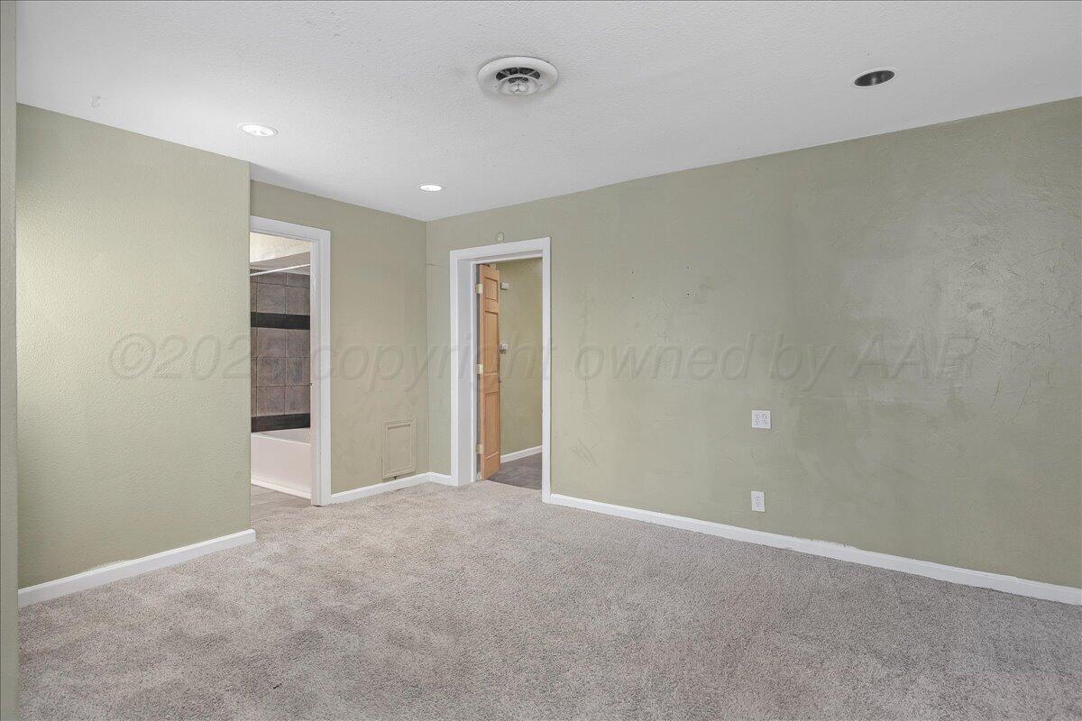 1403 South Hughes Street Amarillo, TX 79102 - Photo 18 of 54 a view of an empty room