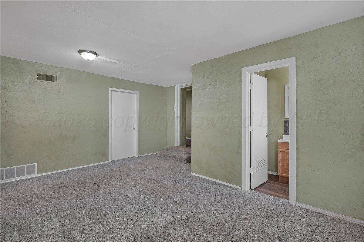 1403 South Hughes Street Amarillo, TX 79102 - Photo 20 of 54 a view of an empty room