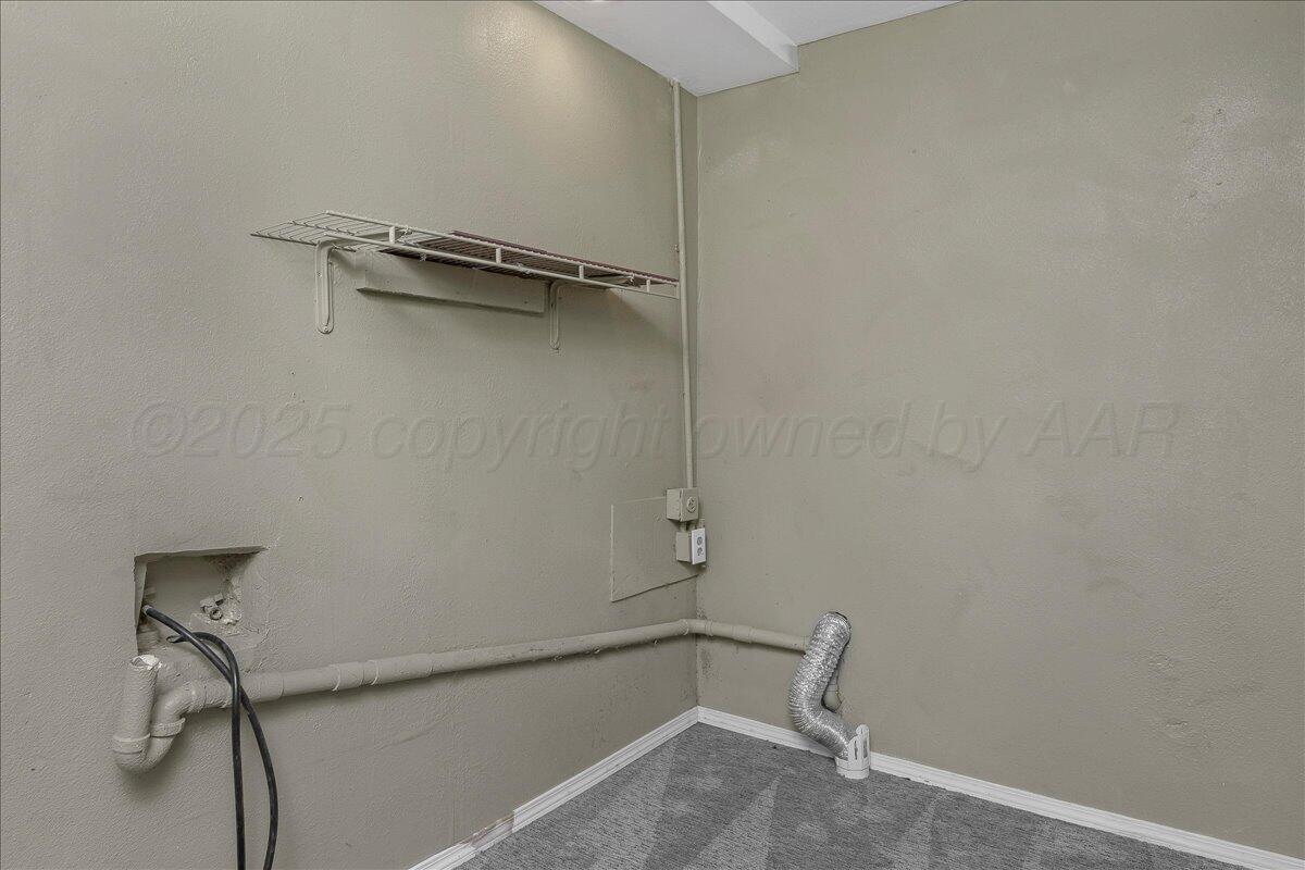 1403 South Hughes Street Amarillo, TX 79102 - Photo 28 of 54 a bathroom with a shower