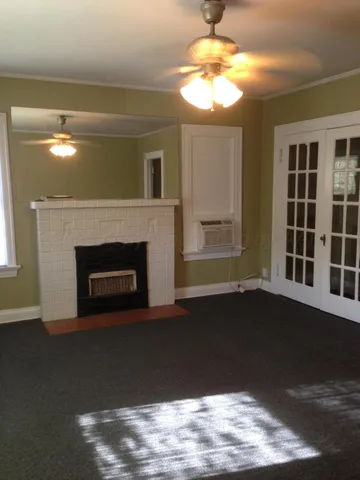 a living room with a fireplace