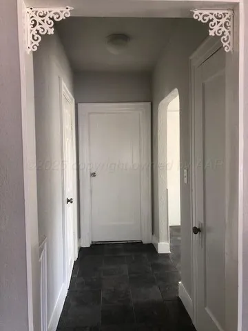 a view of a window in an empty room