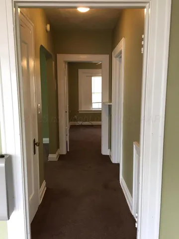 a bathroom with a sink and a window