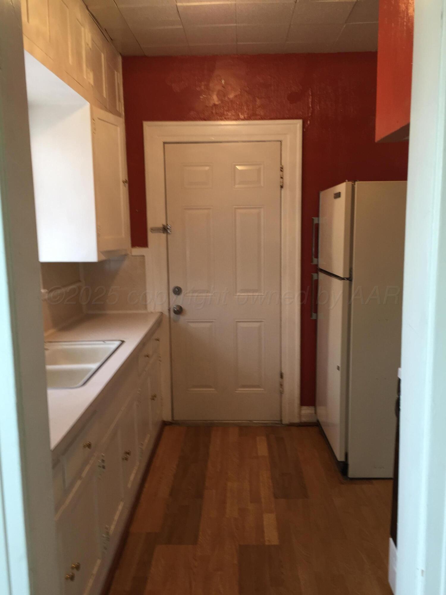 1403 South Hughes Street Amarillo, TX 79102 - Photo 42 of 54 a bathroom with a bathtub and a sink