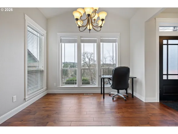 a view of workspace with wooden floor