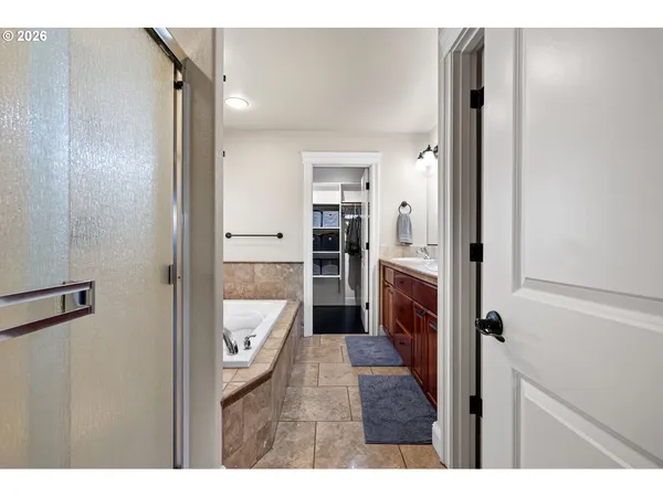 a view of hallway with washer and dryer