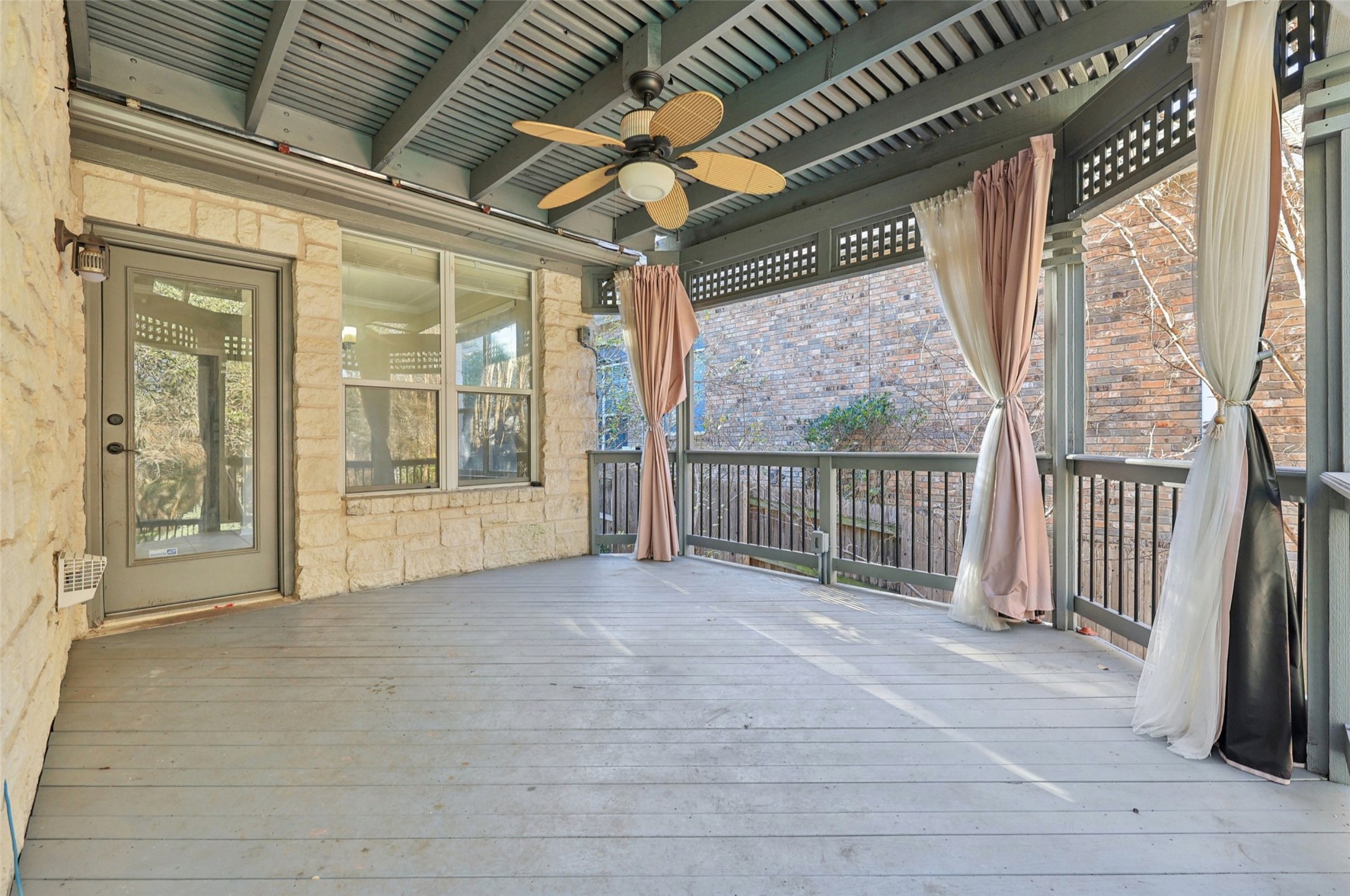2948 Grimes Ranch Road Austin, TX 78732 - Photo 35 of 40 Deck featuring ceiling fan.