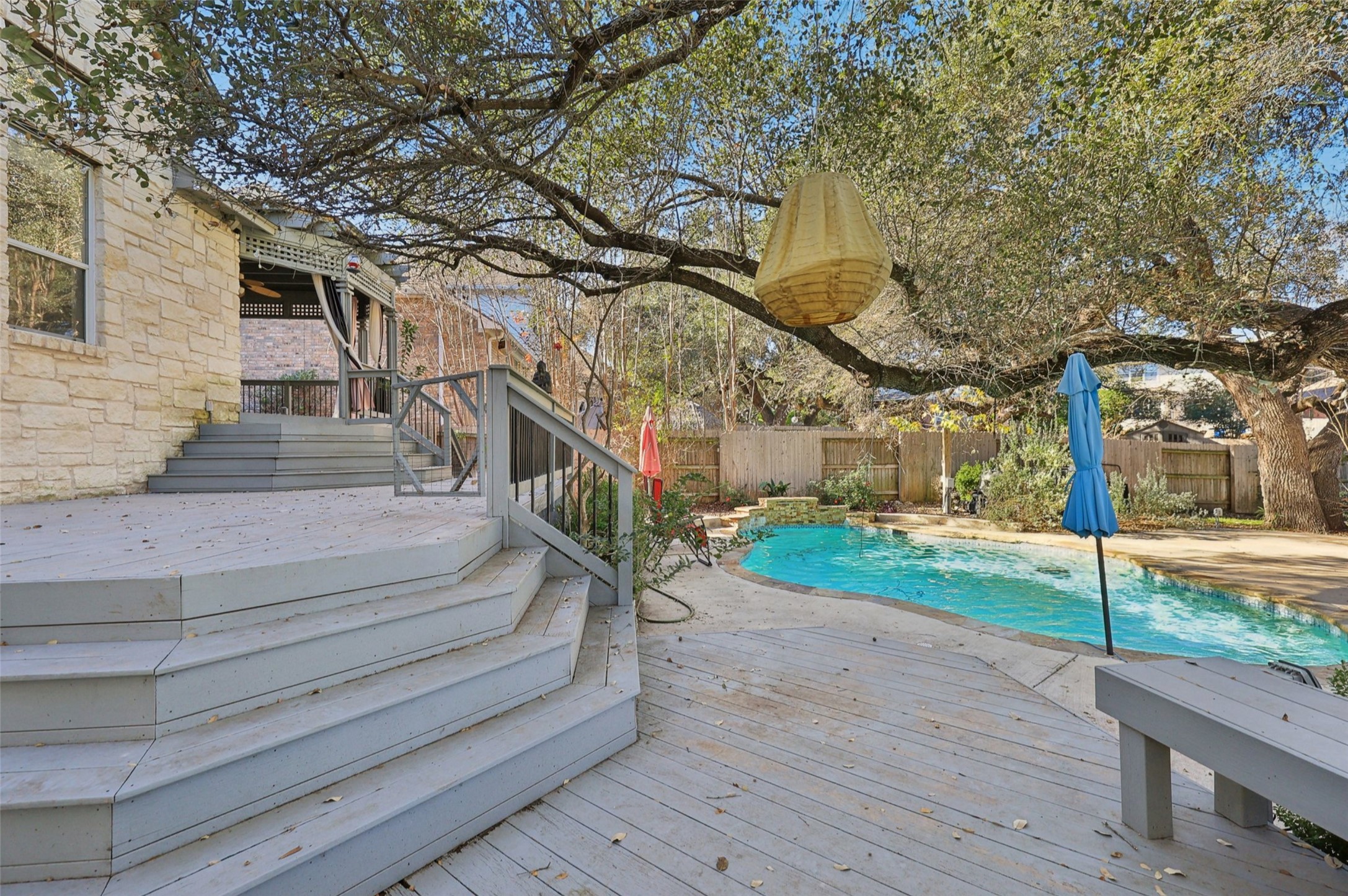 2948 Grimes Ranch Road Austin, TX 78732 - Photo 36 of 40 Wooden terrace featuring fence