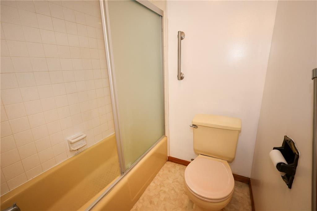 311 Center Street Slippery Rock, PA 16057 - Photo 22 of 32 a white toilet sitting next to a shower