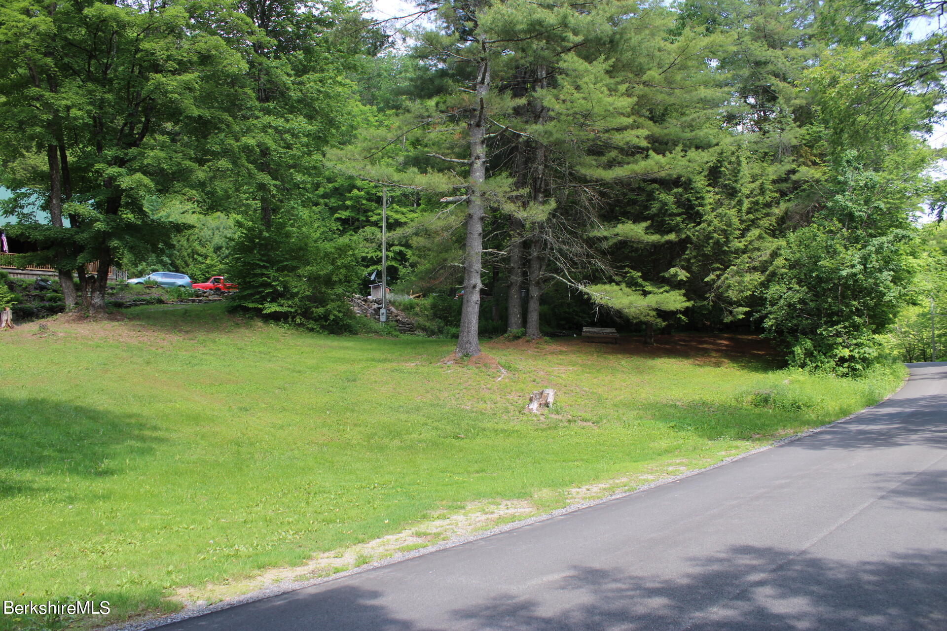 175 River Road Windsor, MA 01270 - Photo 4 of 22 a view of a field of grass and basketball court