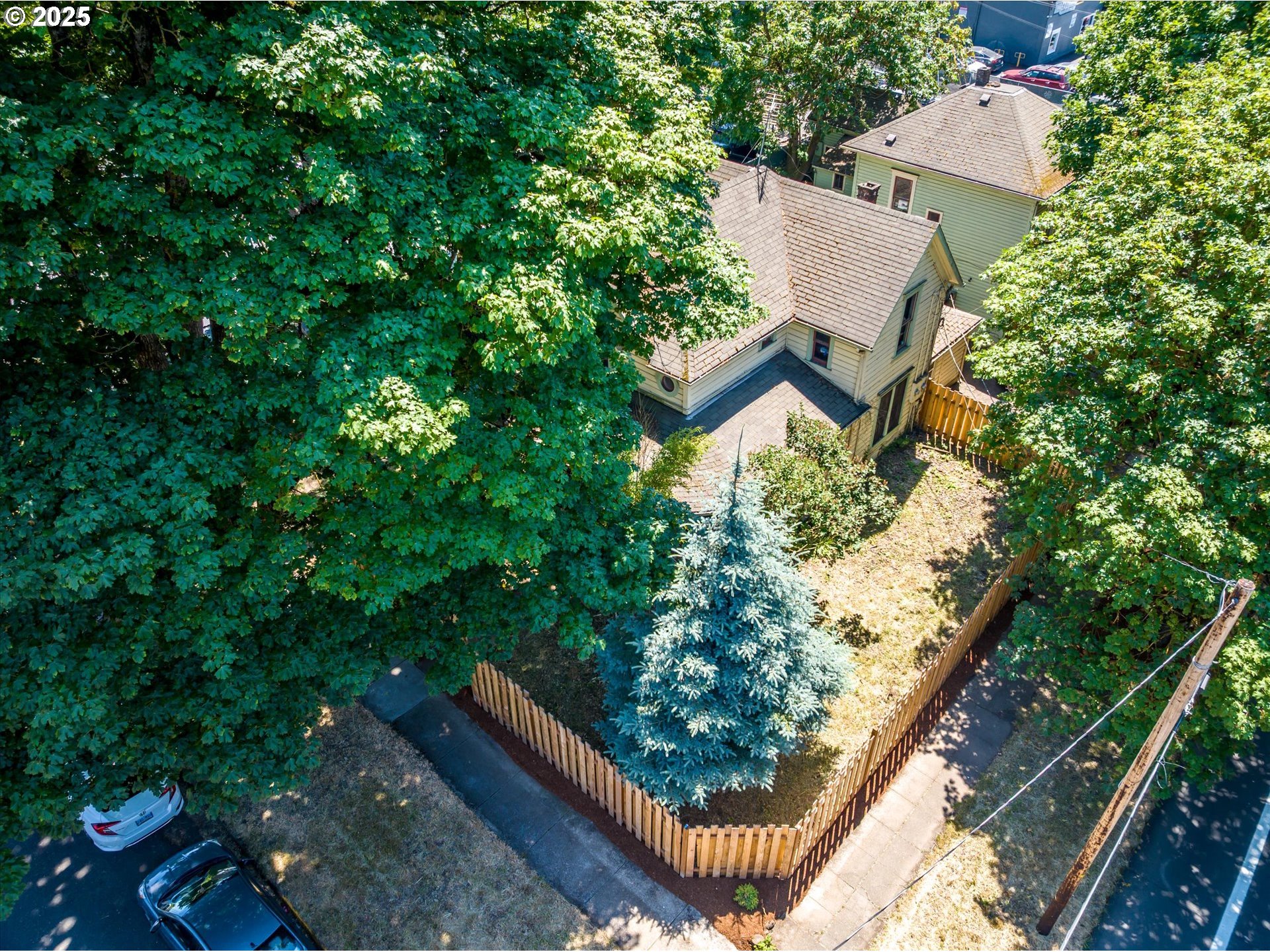 490 West 4th Avenue Eugene, OR 97401 - Photo 16 of 25 an aerial view of house with yard and outdoor seating