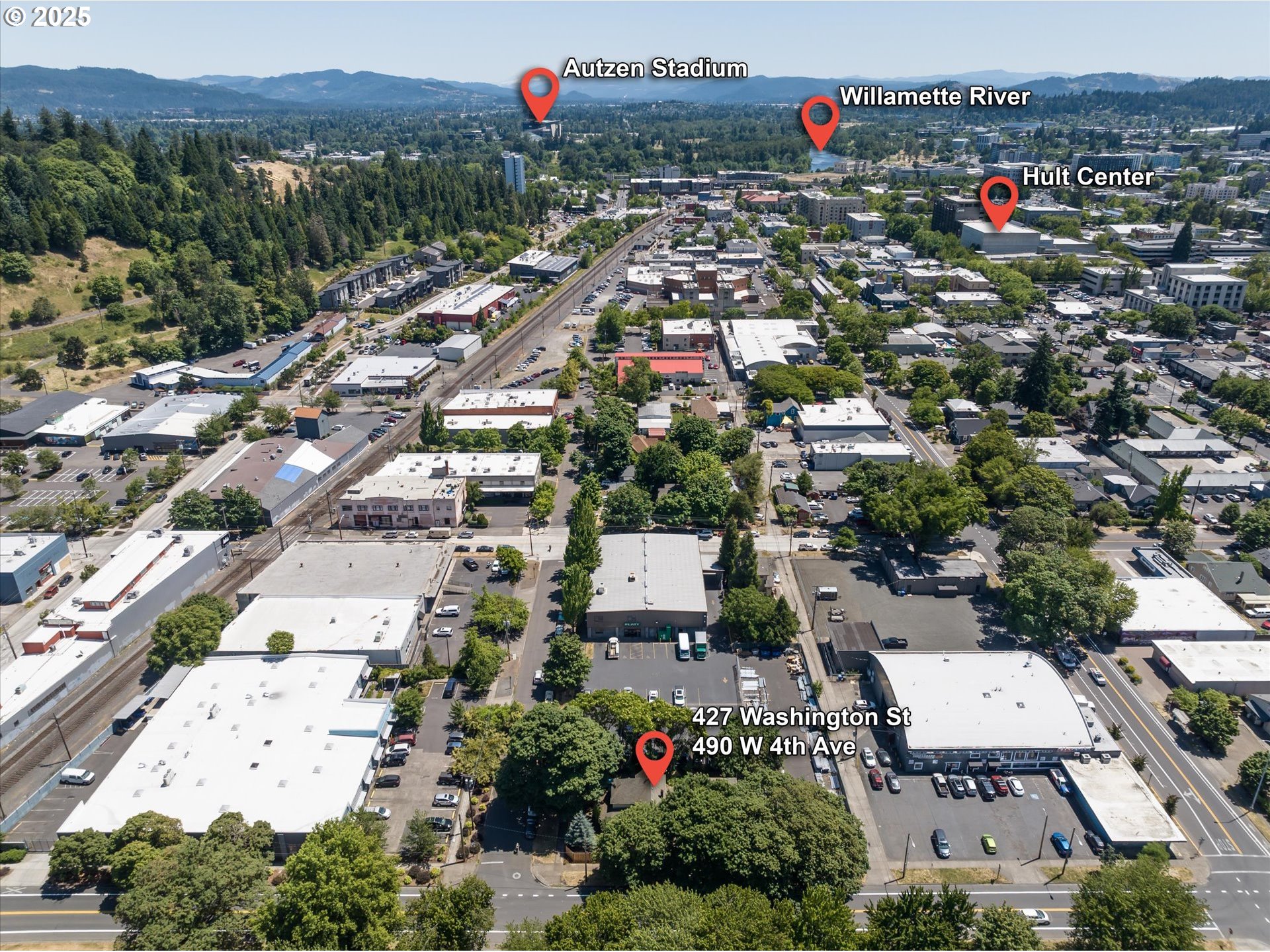 490 West 4th Avenue Eugene, OR 97401 - Photo 23 of 25 an aerial view of residential houses with outdoor space