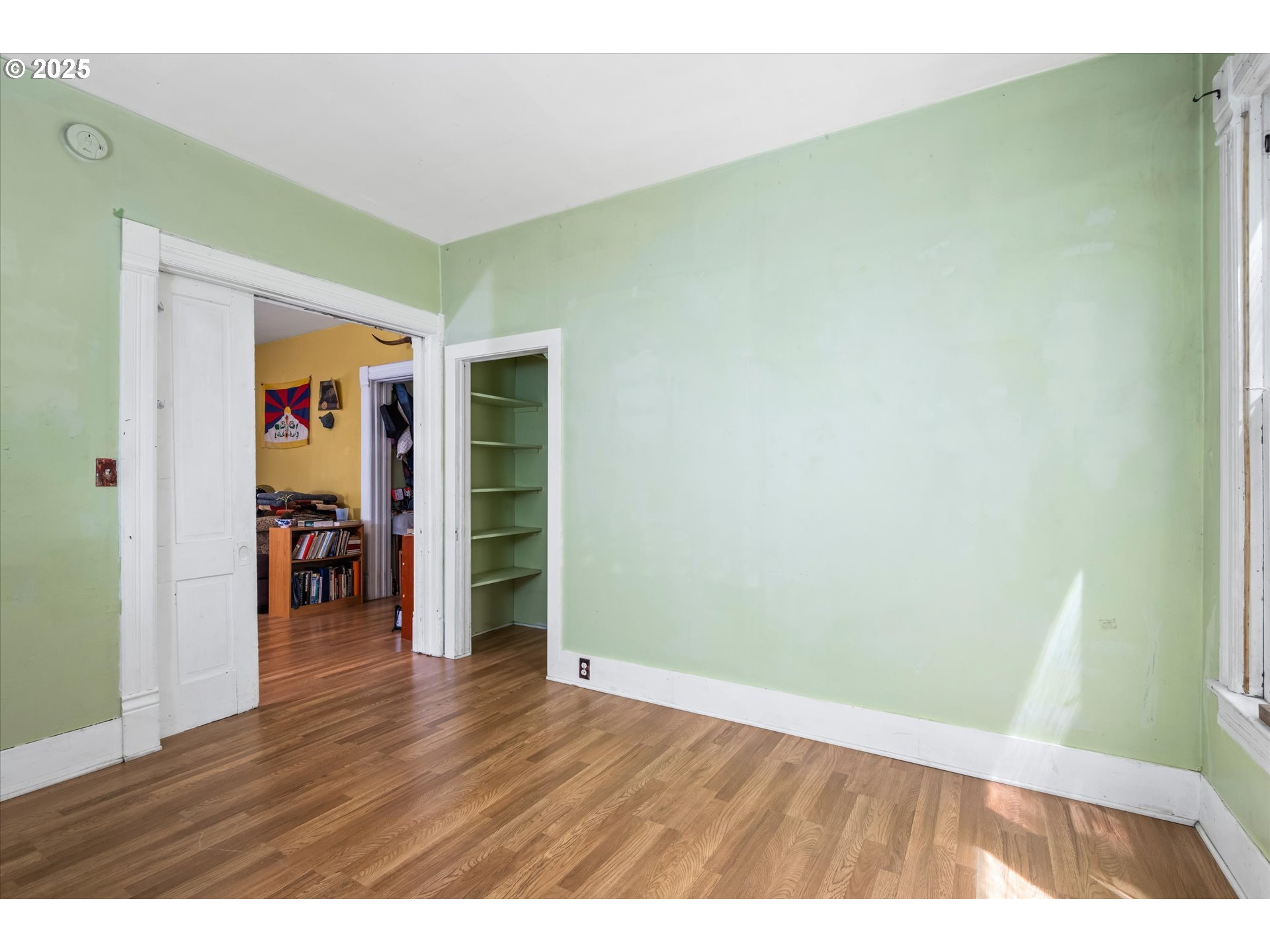 490 West 4th Avenue Eugene, OR 97401 - Photo 8 of 25 a view of an empty room with wooden floor