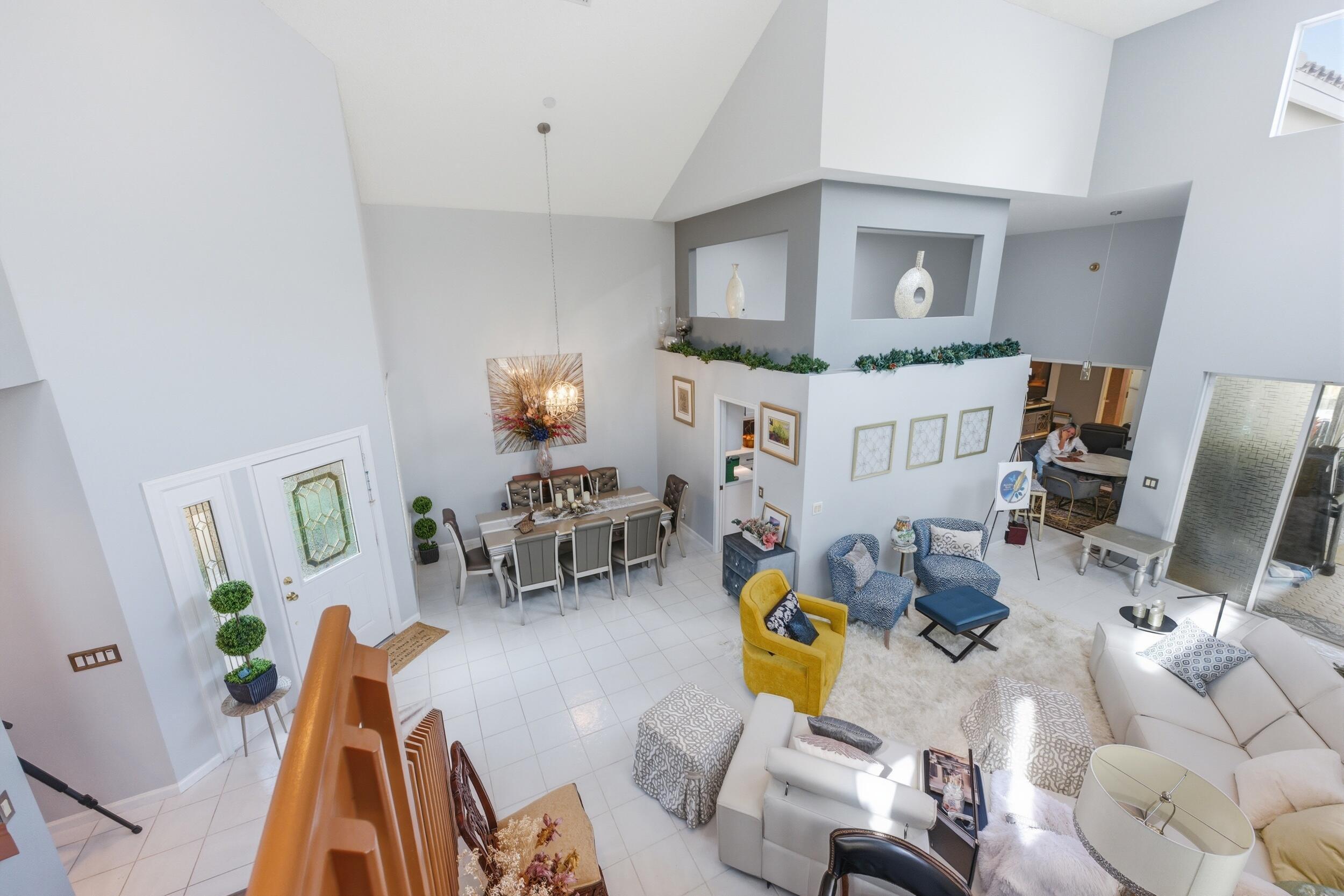 2495 Northwest 66th Drive Boca Raton, FL 33496 - Photo 28 of 74 a living room with furniture and a flat screen tv