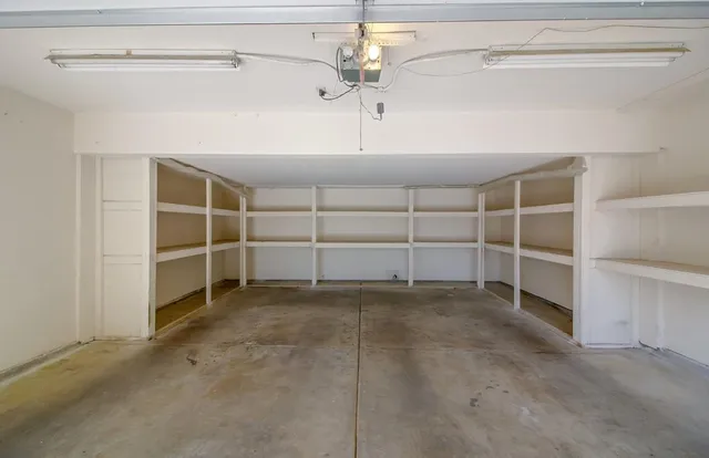 a view of a pathway with a yard