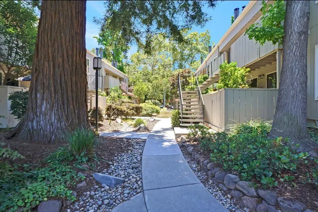 a view of street with parked cars