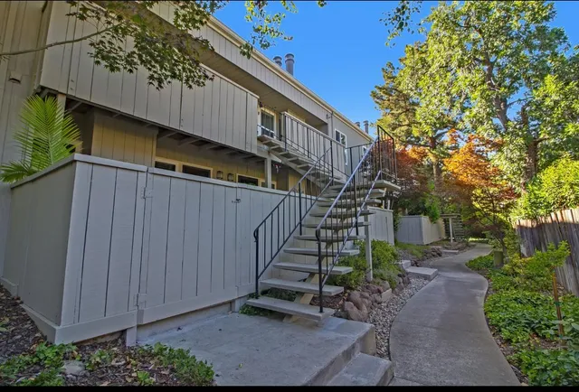 a backyard of a house with lots of green space