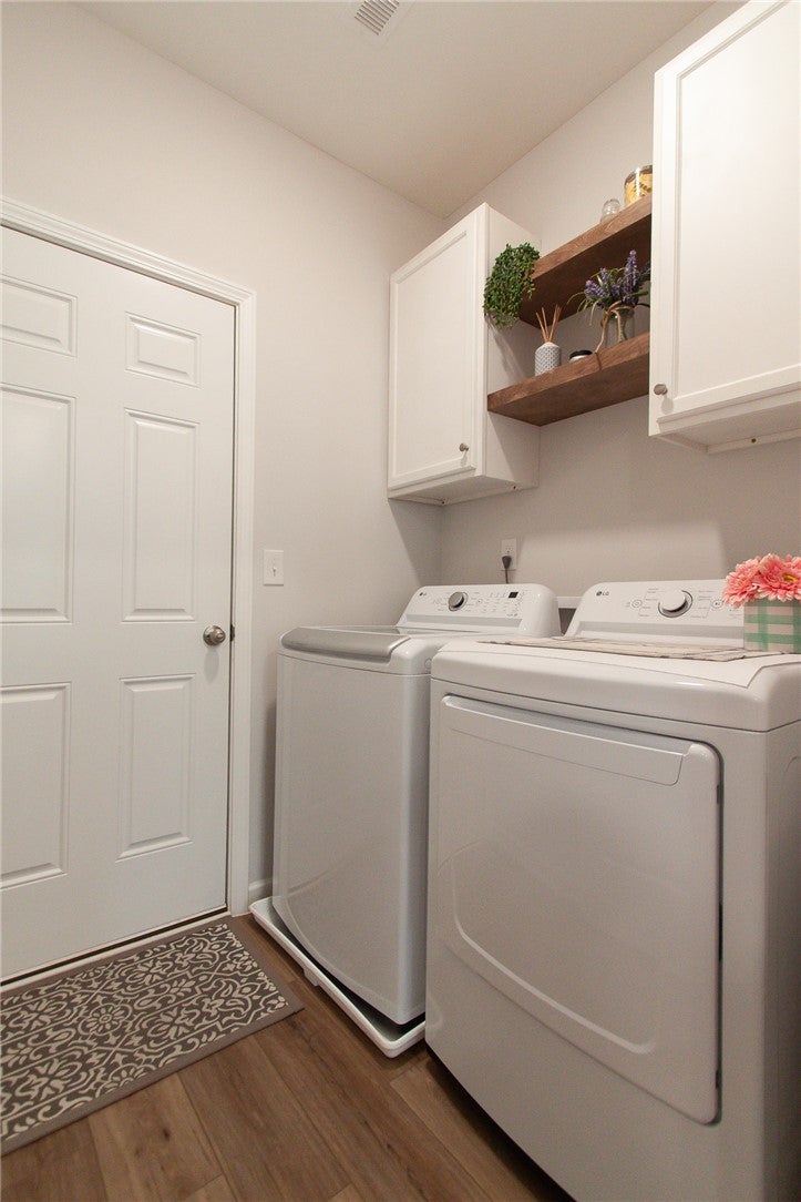 3173 Raiden Circle Opelika, AL 36804 - Photo 8 of 26 Laundry with Added Cabinets