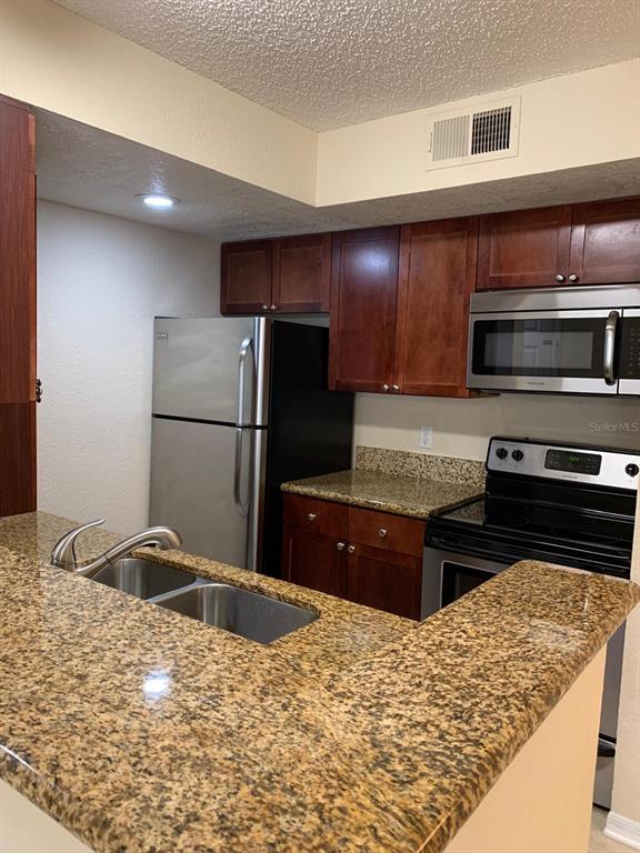5112 Conroy Road, Unit 14 Orlando, FL 32811 - Photo 2 of 19 Gallery Image 2