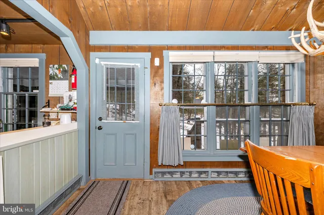 a outdoor space with patio the couches and potted plants