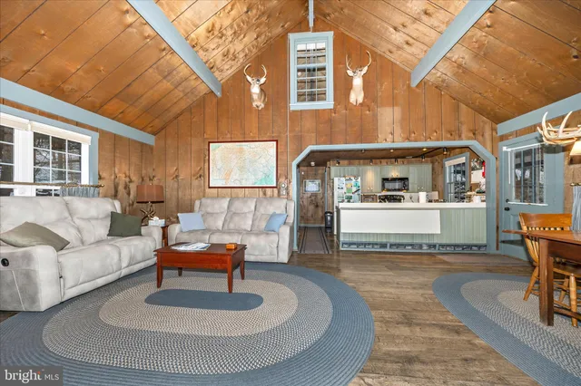 a view of a patio with table and chairs