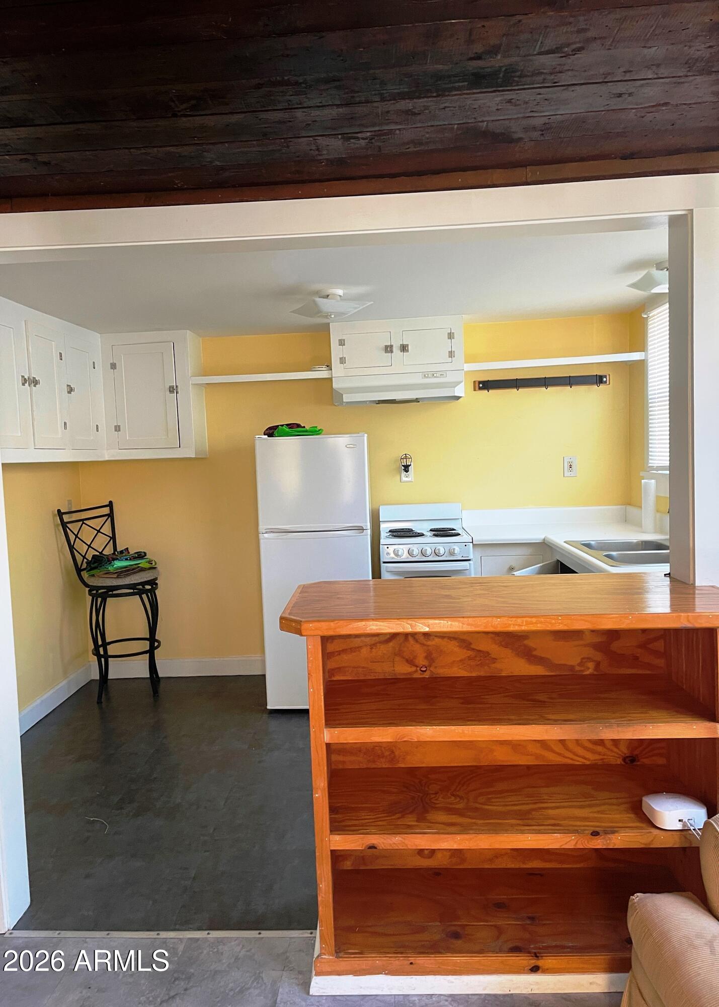 134 C Quality Hill Road, Unit DOWN Bisbee, AZ 85603 - Photo 3 of 10 Partial kitchen