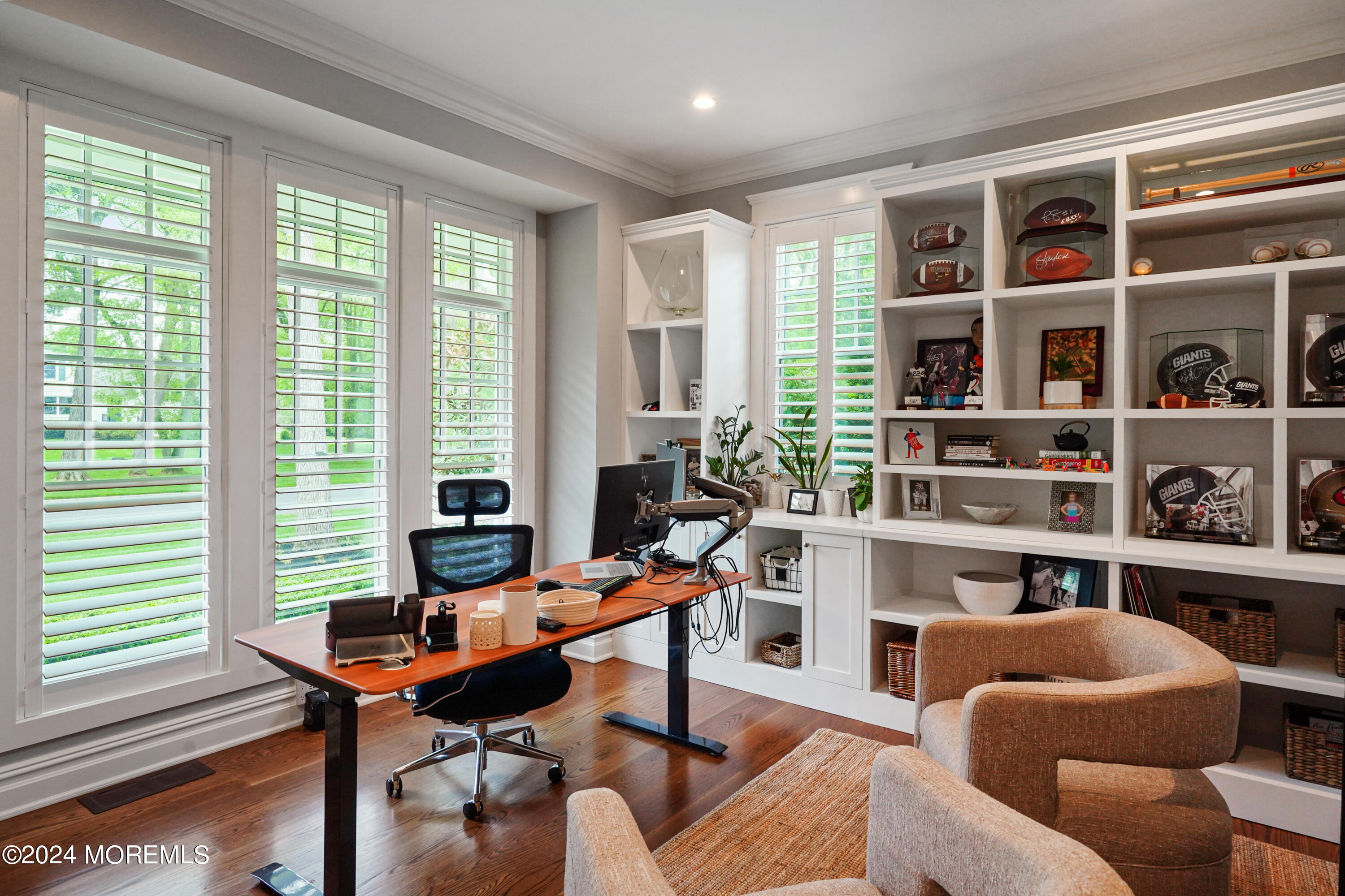15 Mitchell Place Little Silver, NJ 07739 - Photo 14 of 39 a living room with furniture and a bookshelf