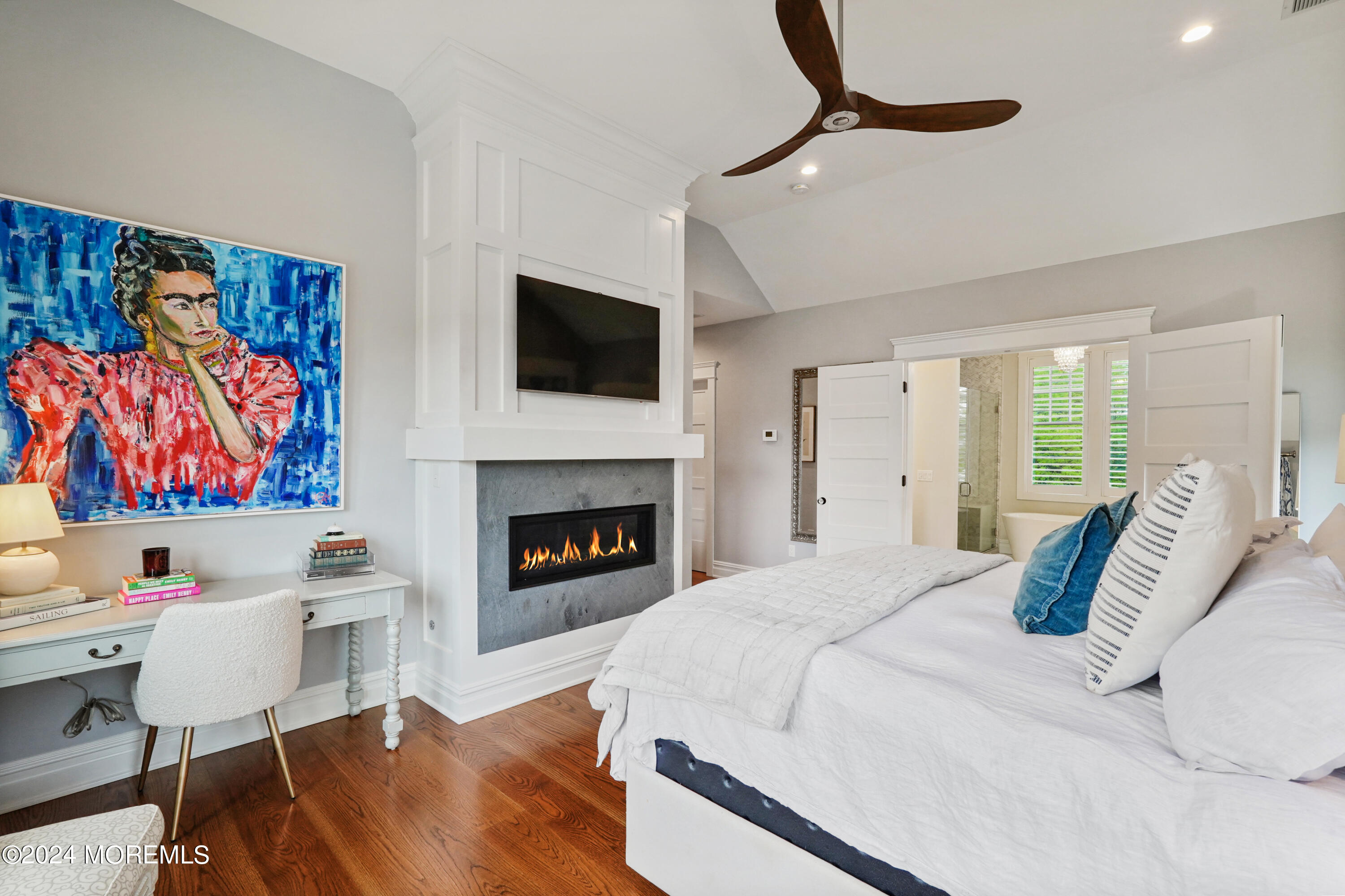 15 Mitchell Place Little Silver, NJ 07739 - Photo 15 of 39 a bed room with furniture and a fireplace