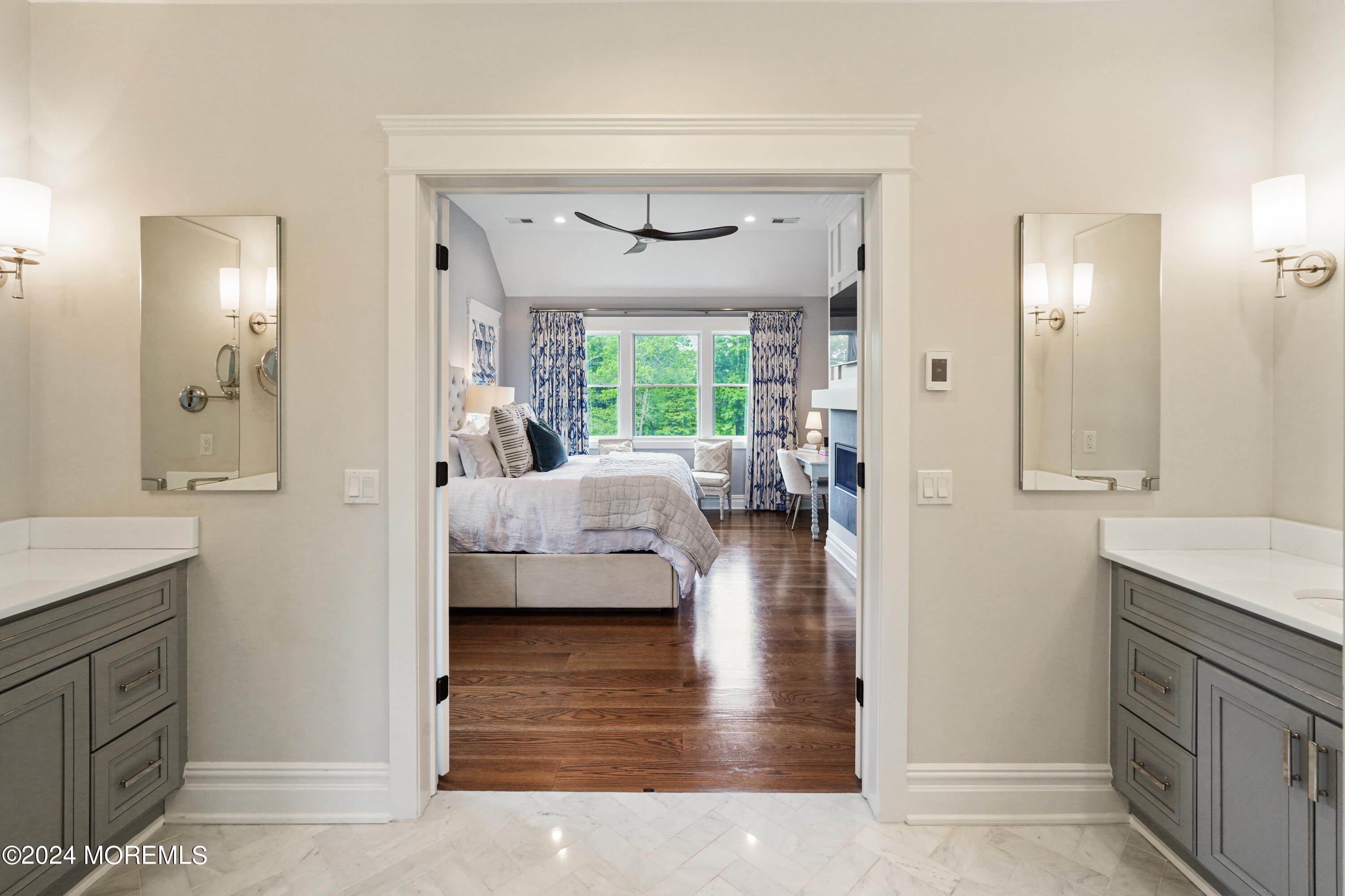 15 Mitchell Place Little Silver, NJ 07739 - Photo 17 of 39 a en suite bathroom with a double vanity sink a mirror and a shower
