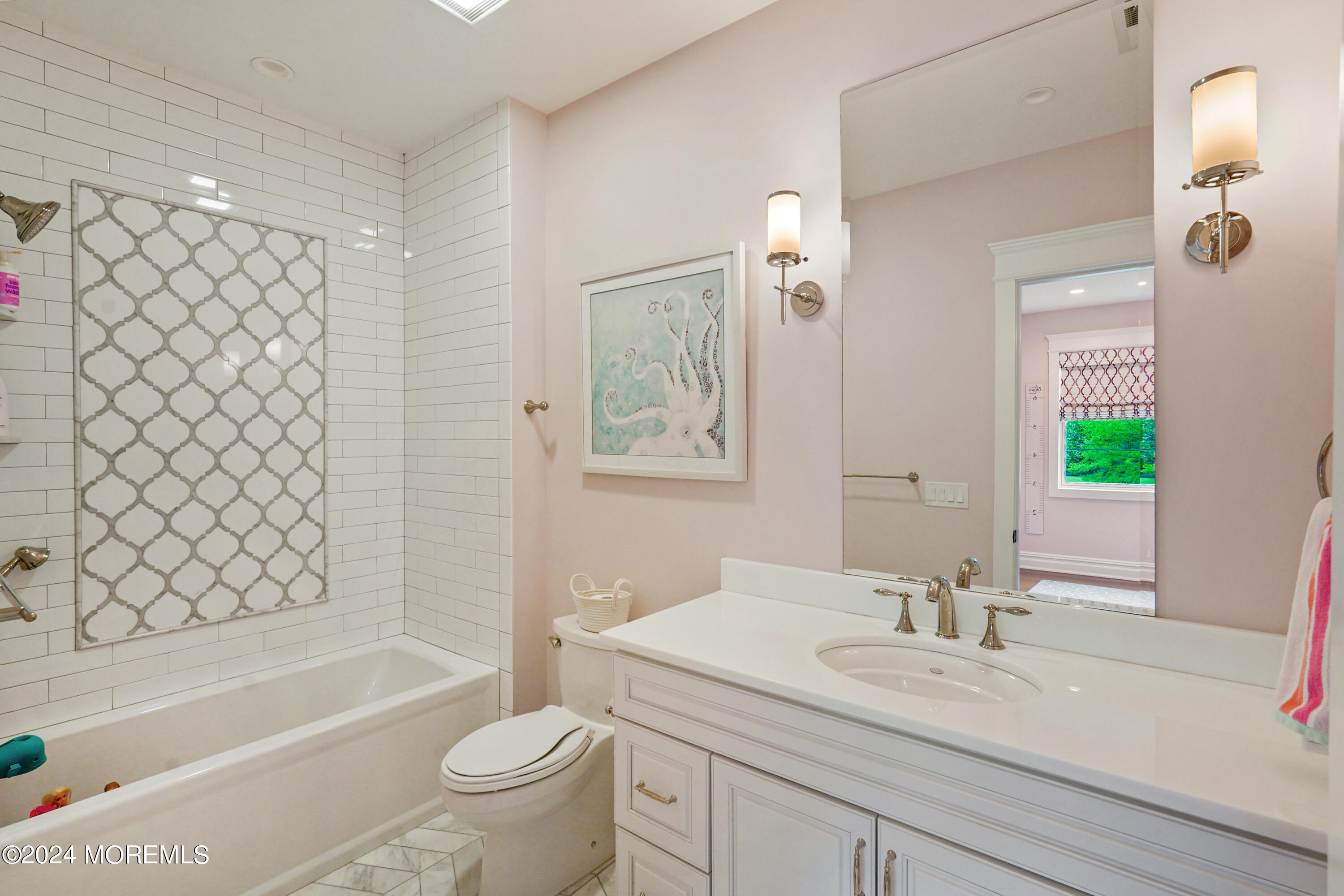 15 Mitchell Place Little Silver, NJ 07739 - Photo 21 of 39 a bathroom with a sink a toilet and a large mirror