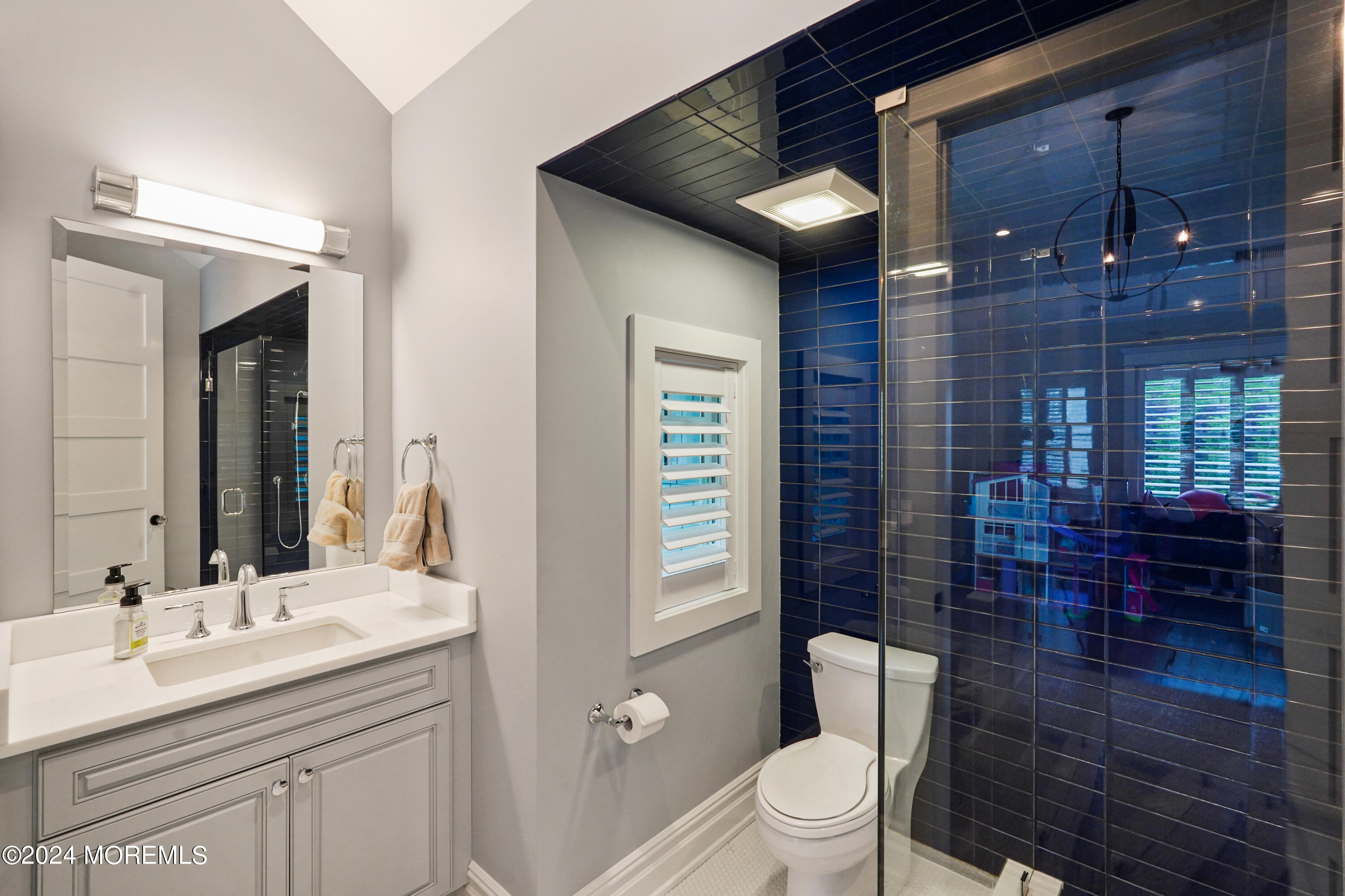 15 Mitchell Place Little Silver, NJ 07739 - Photo 29 of 39 a bathroom with a sink a toilet and shower