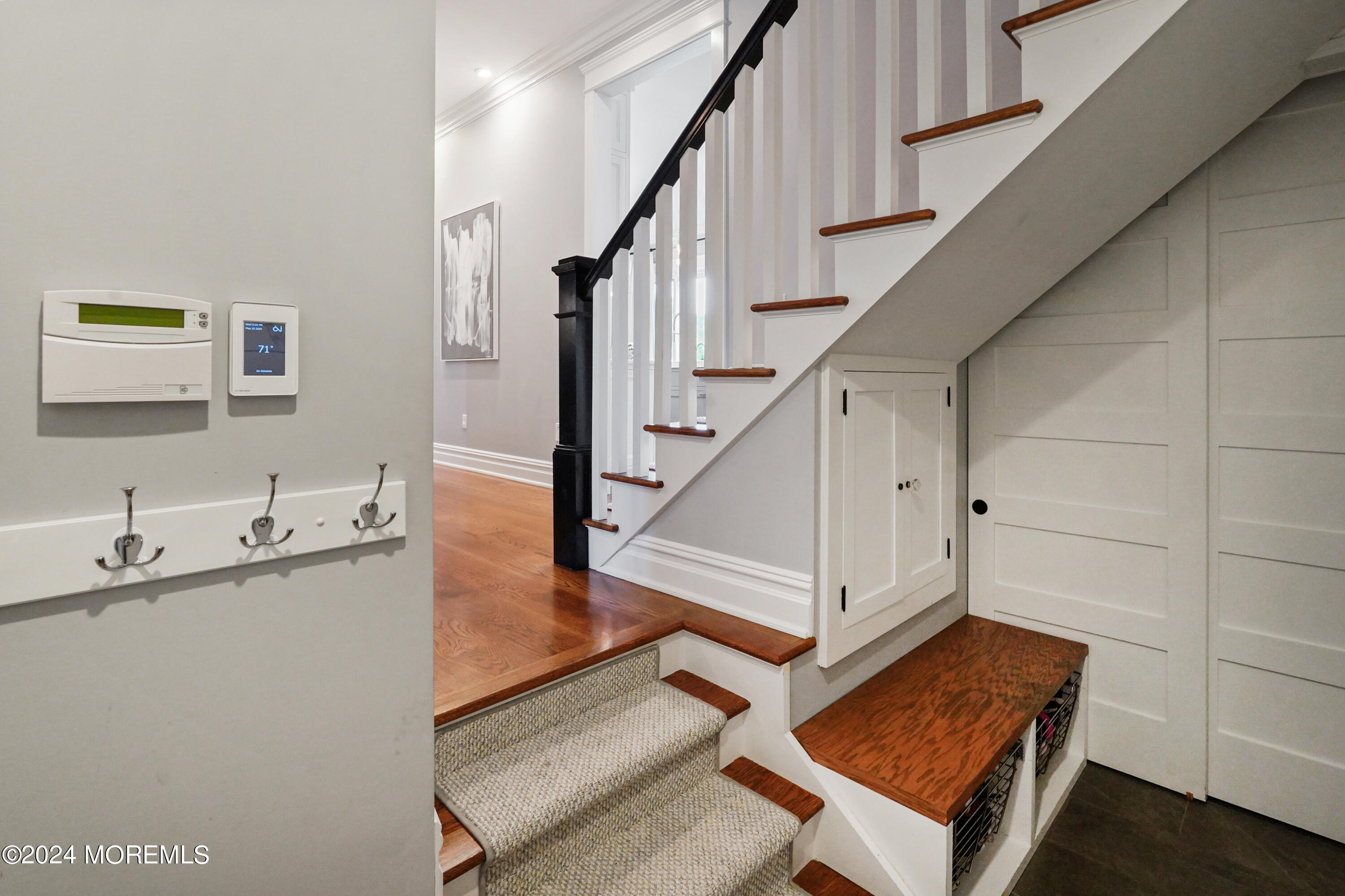 15 Mitchell Place Little Silver, NJ 07739 - Photo 30 of 39 a view of hallway with stairs and wooden floor