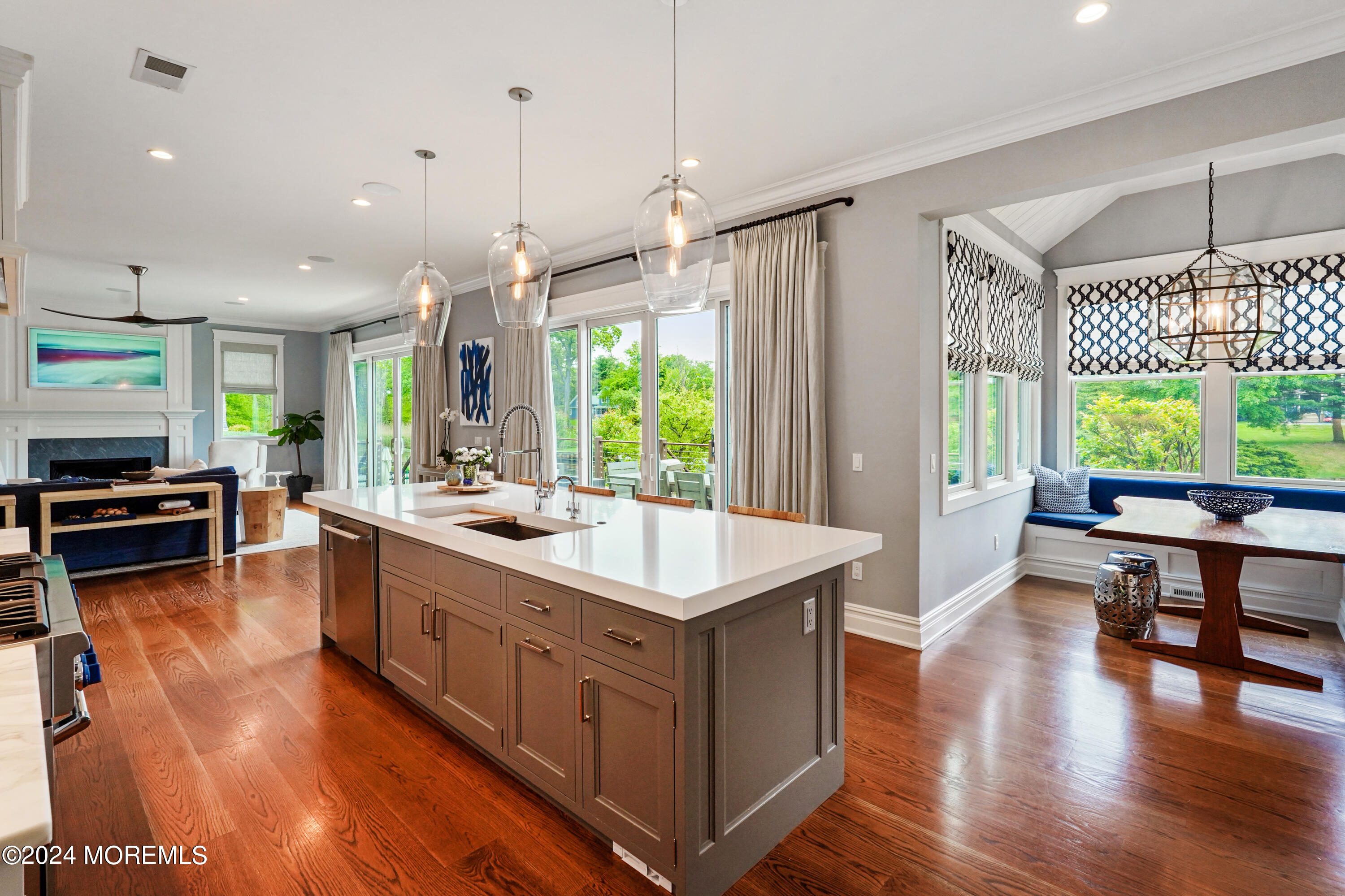 15 Mitchell Place Little Silver, NJ 07739 - Photo 8 of 39 a kitchen with stainless steel appliances granite countertop a stove and a wooden floors