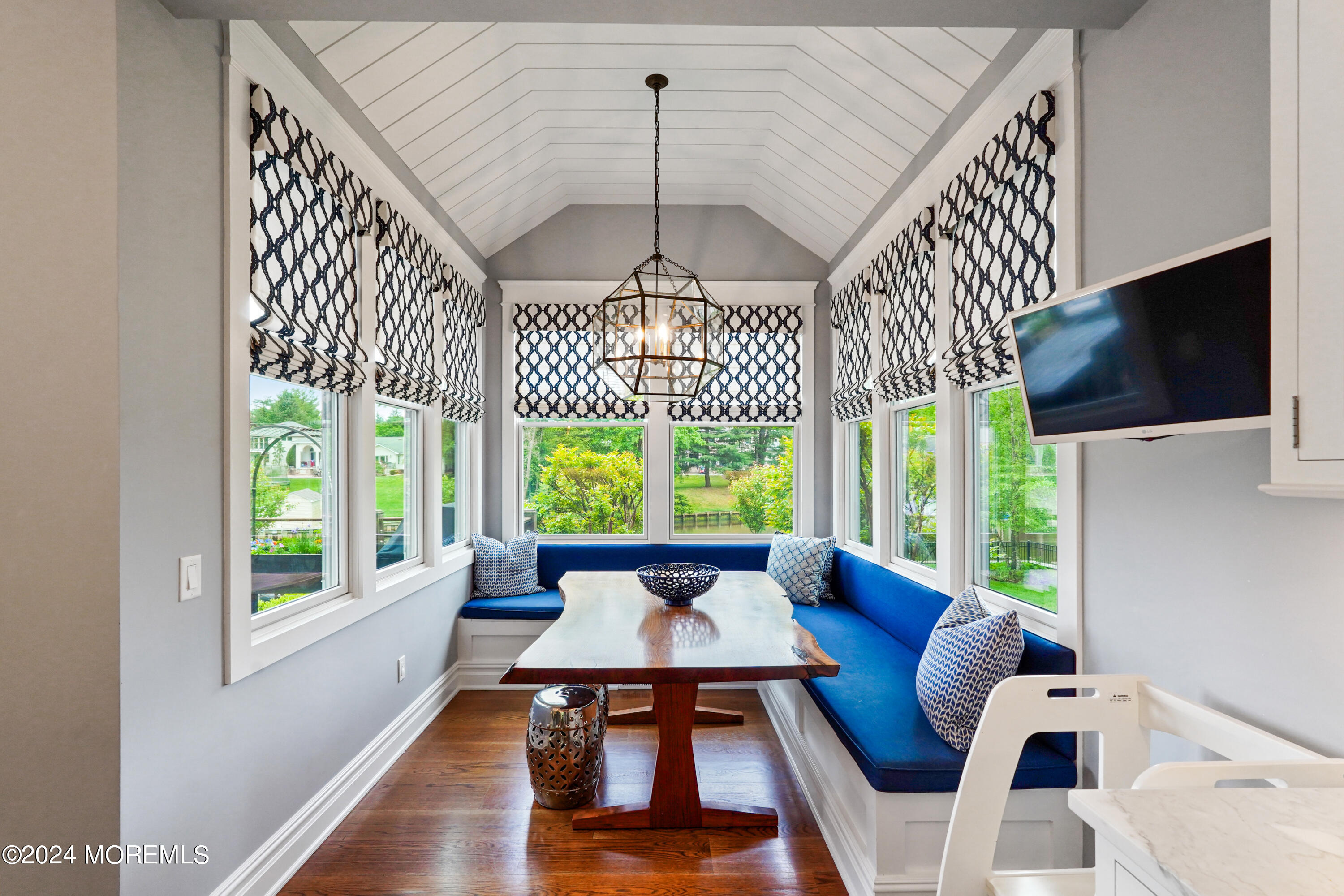 15 Mitchell Place Little Silver, NJ 07739 - Photo 9 of 39 a living room with furniture and a chandelier