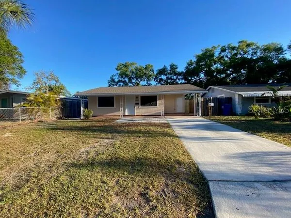 front view of a house with a yard