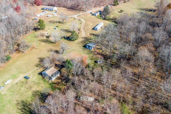 an aerial view of residential house with outdoor space