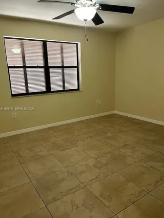 a view of a room with rack and window