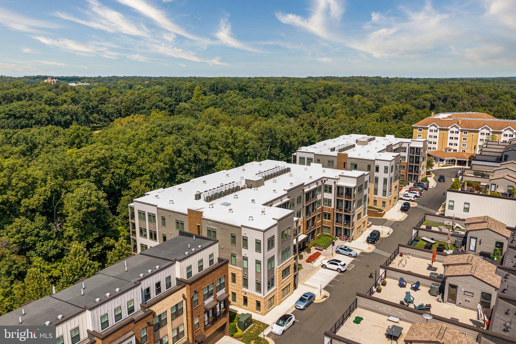 1669 Bandit Loop, Unit 103A Reston, VA 20190 - Photo 4 of 15 Condo in the distance backing to trees